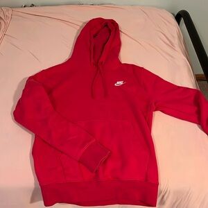 Hot pink Nike club hoodie.